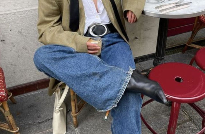 women wearing extra flare jeans at coffee shop