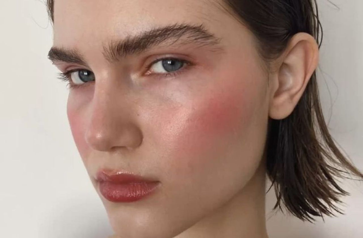 pale skin women wearing peachy blush
