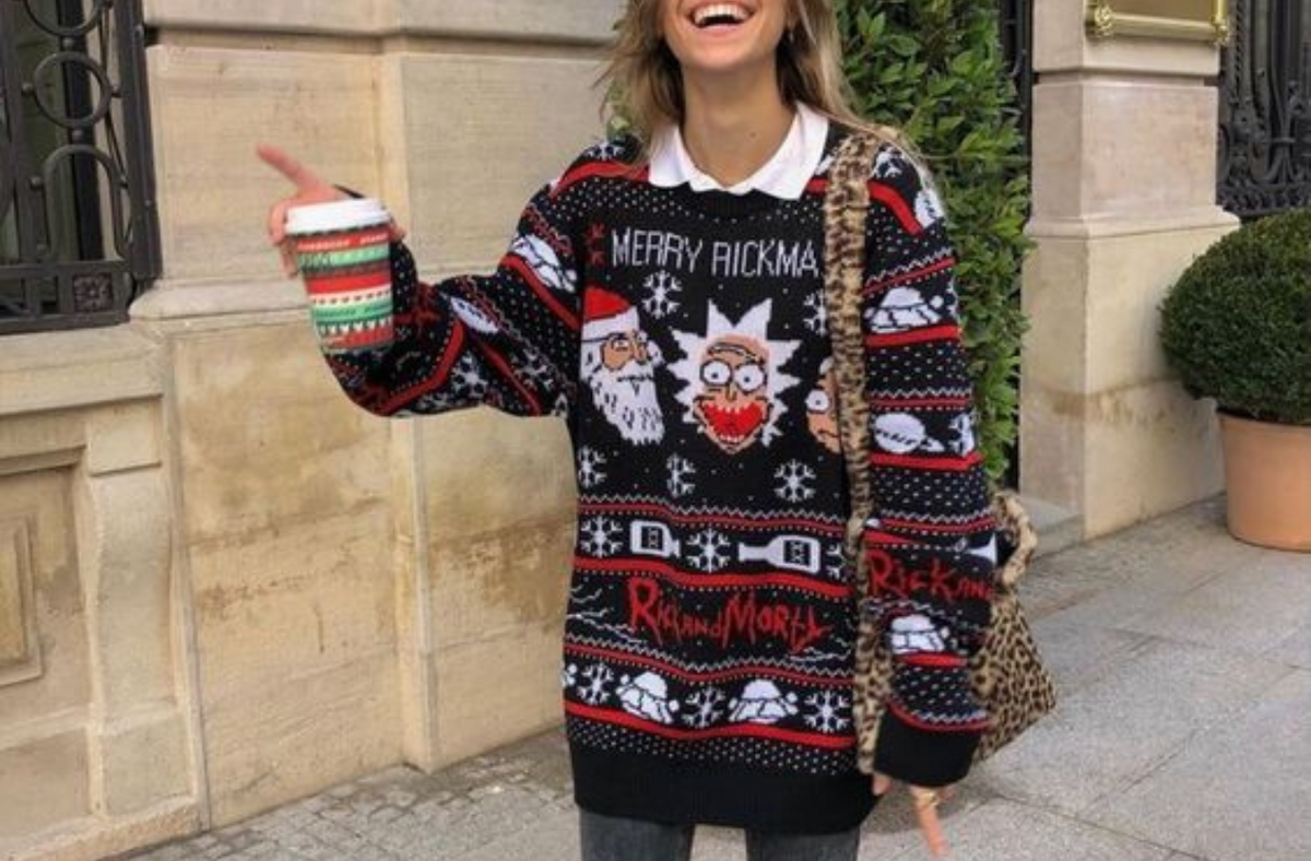 women on the street wearing christmas sweater cute