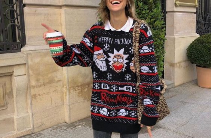 women on the street wearing christmas sweater cute